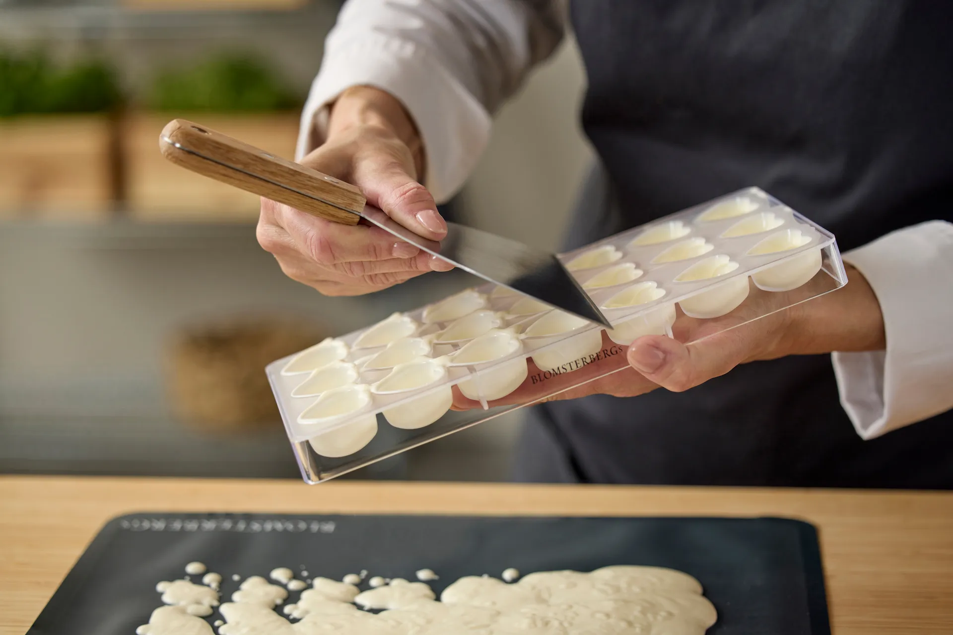Blomsterbergs chokladskrapa, Ek-rostfritt stål Blomsterbergs