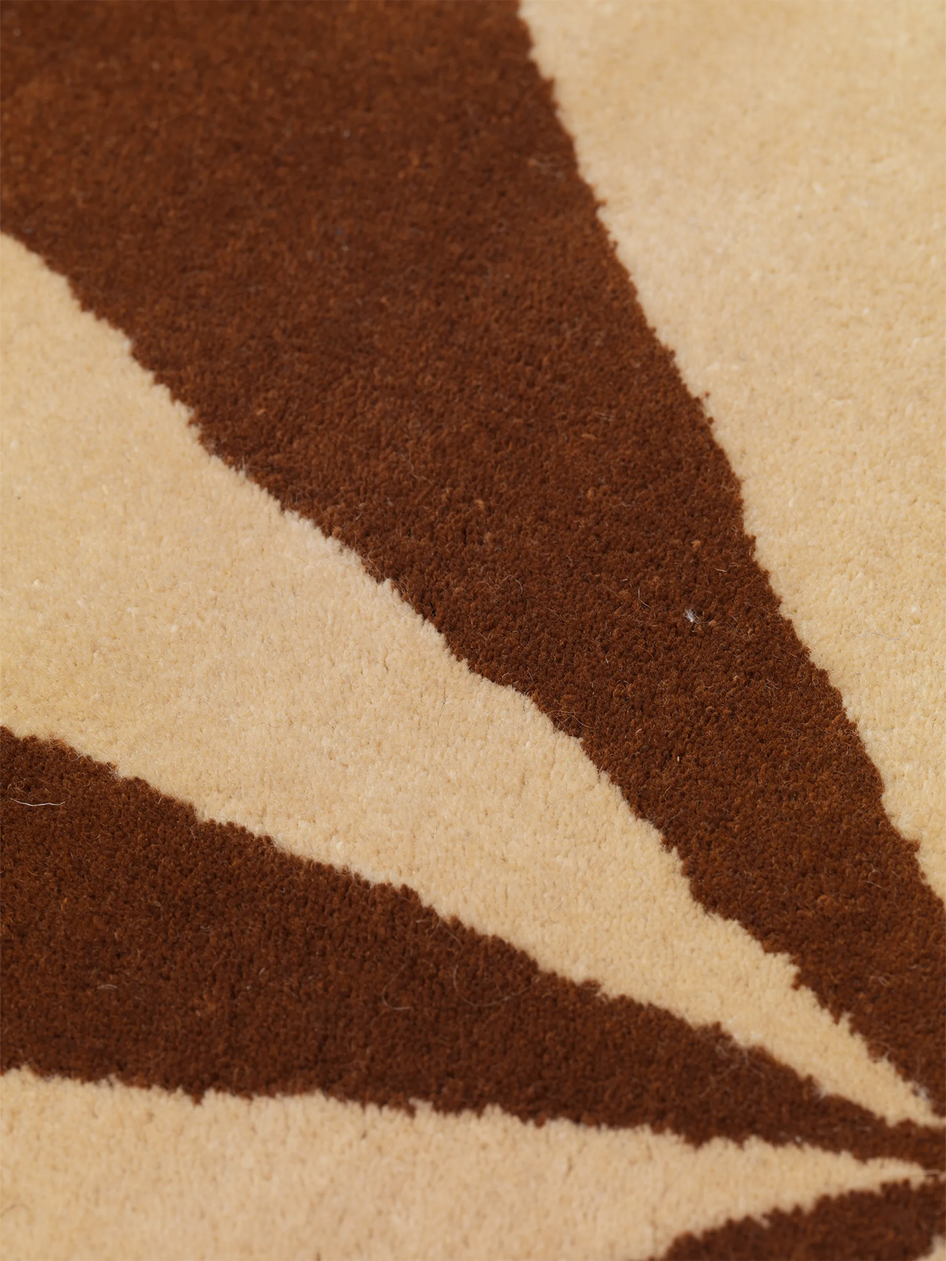 Arch handtuftad matta Ø130 cm, Dark brick-Off white Ferm Living