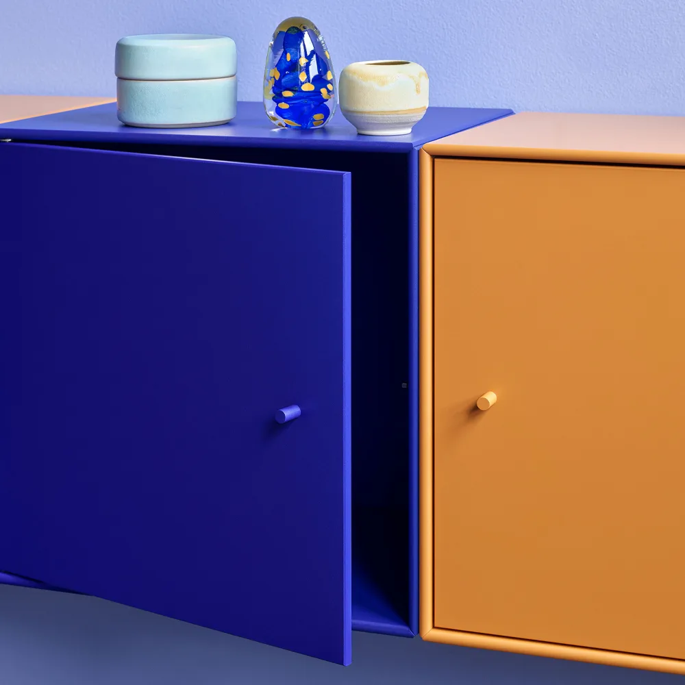 Montana Mini 1103 hyllmodul, amber 142, med dörr Montana