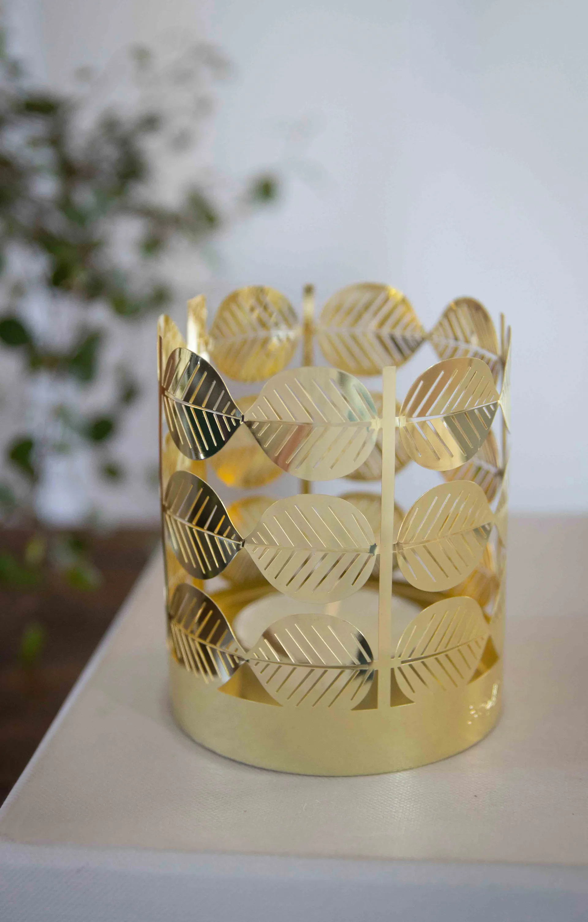 Stig L Berså ljuslykta, Guld Pluto Design