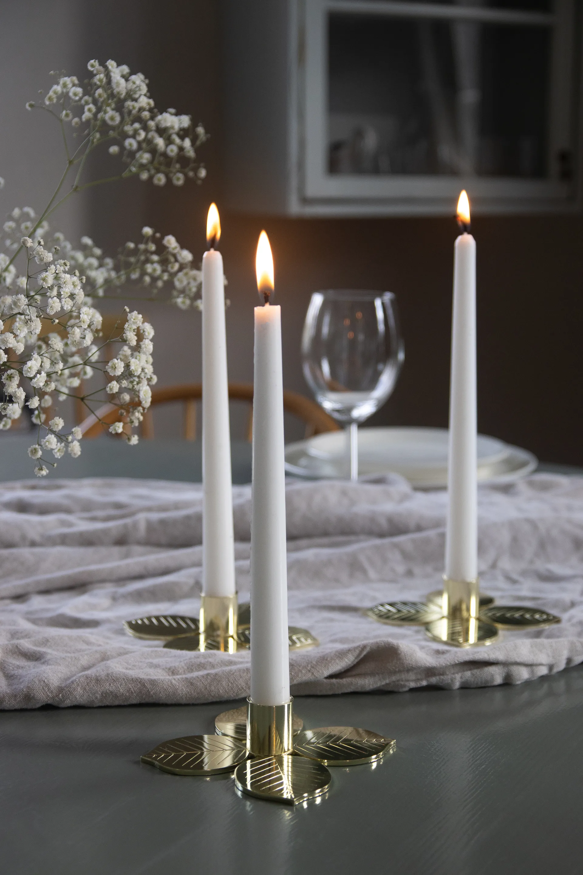 Stig L Berså ljusstake, Guld Pluto Design