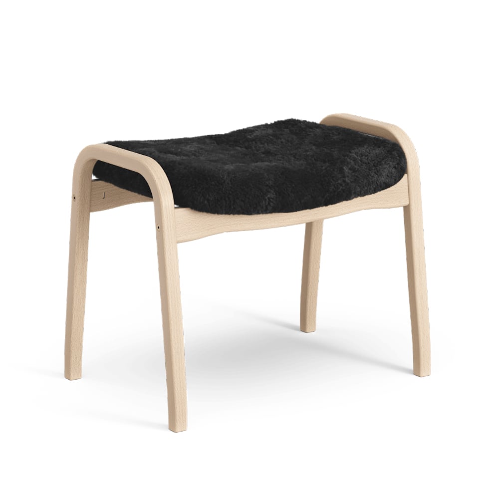 Swedese Lamino fotpall Fårskinn black-naturlackad bok