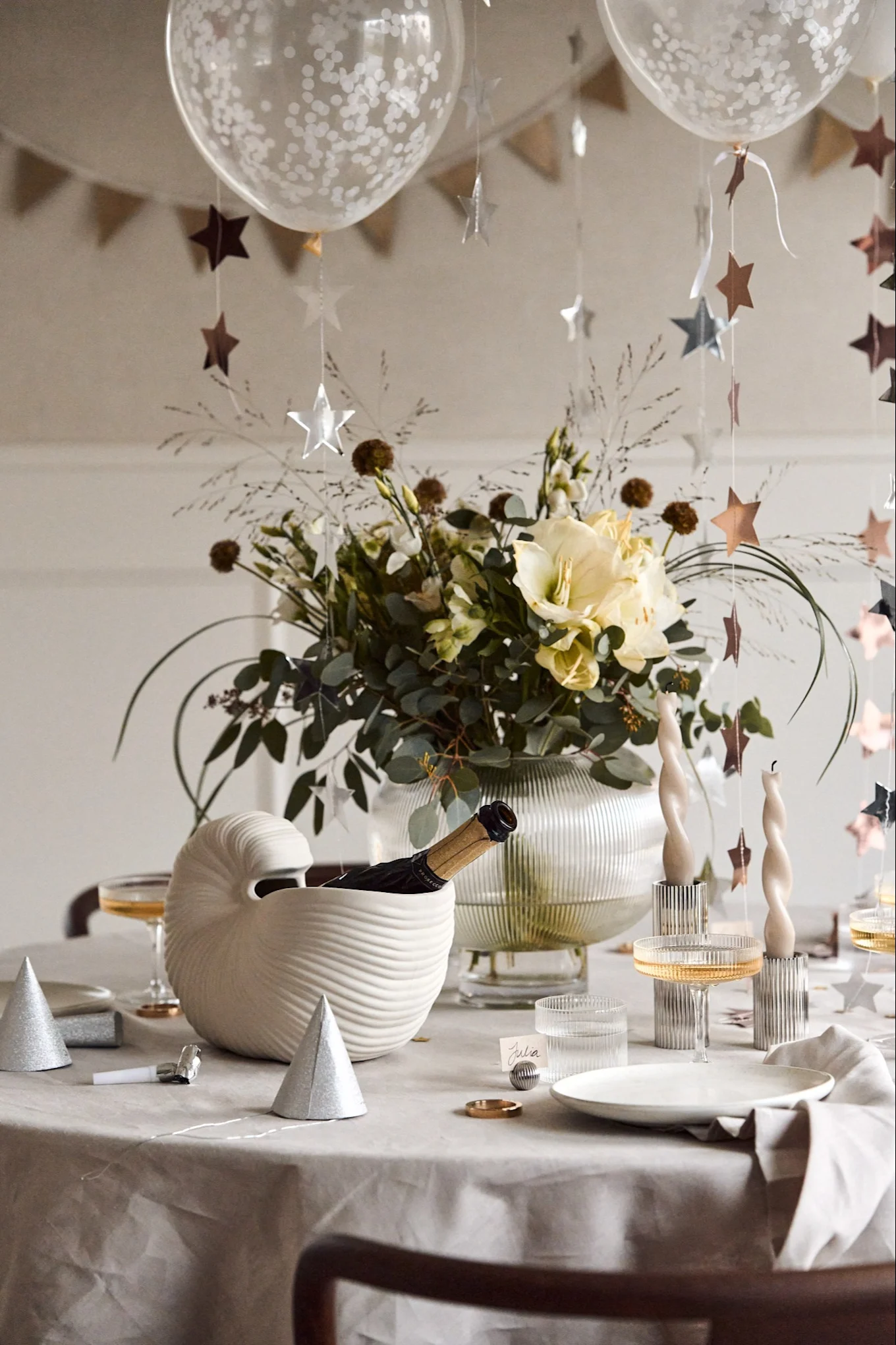 En vinkylare som föreställer ett snäckskal passar bara till nyårsfirandet och till aktiviteter och nyårslekar..