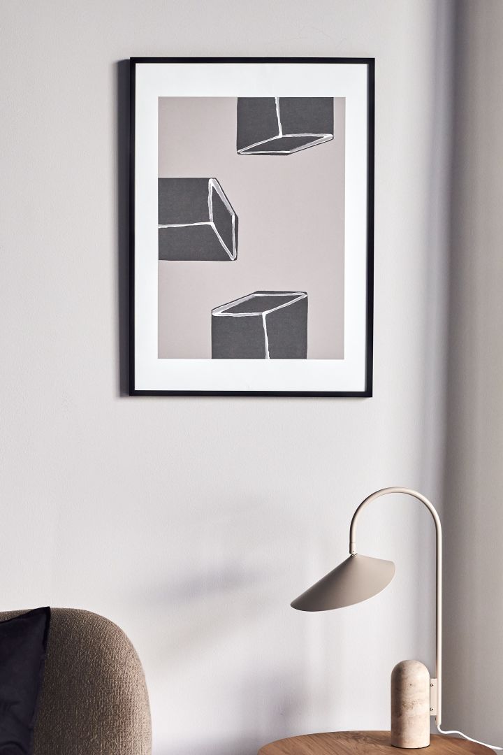 17 snygga posters att inreda ditt hem med - här ser du abstrakta Dimensions poster från Scandi Living i toner av grått och vitt som föreställer grafiska kuber.