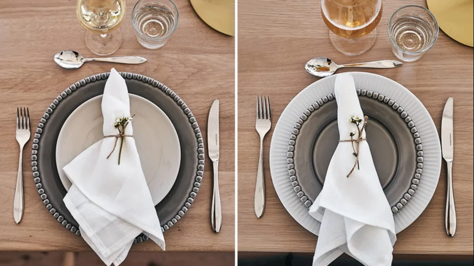 En sommardukning där porslin blandats för en helhet i jordiga toner med hjälp av tallrikar från Eva Solo, ERNST och PotteryJo.