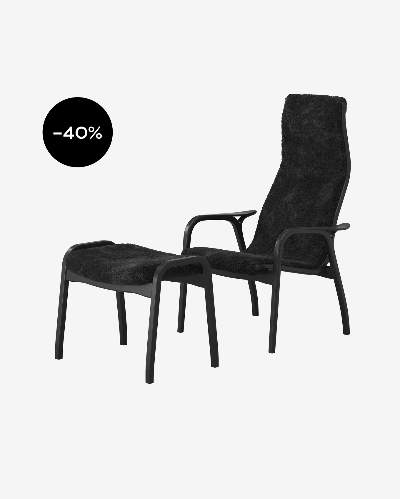 En svart fåtölj och fotpall med pälsklädsel, med en -40% rabattskylt.