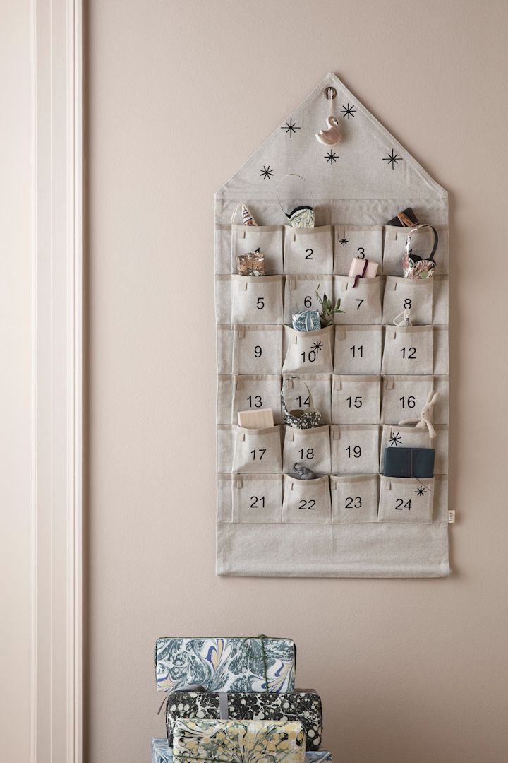 Star adventskalender i tyg från ferm living - perfekt att fylla med julklappar till vuxna som barn inför stundande jul. 